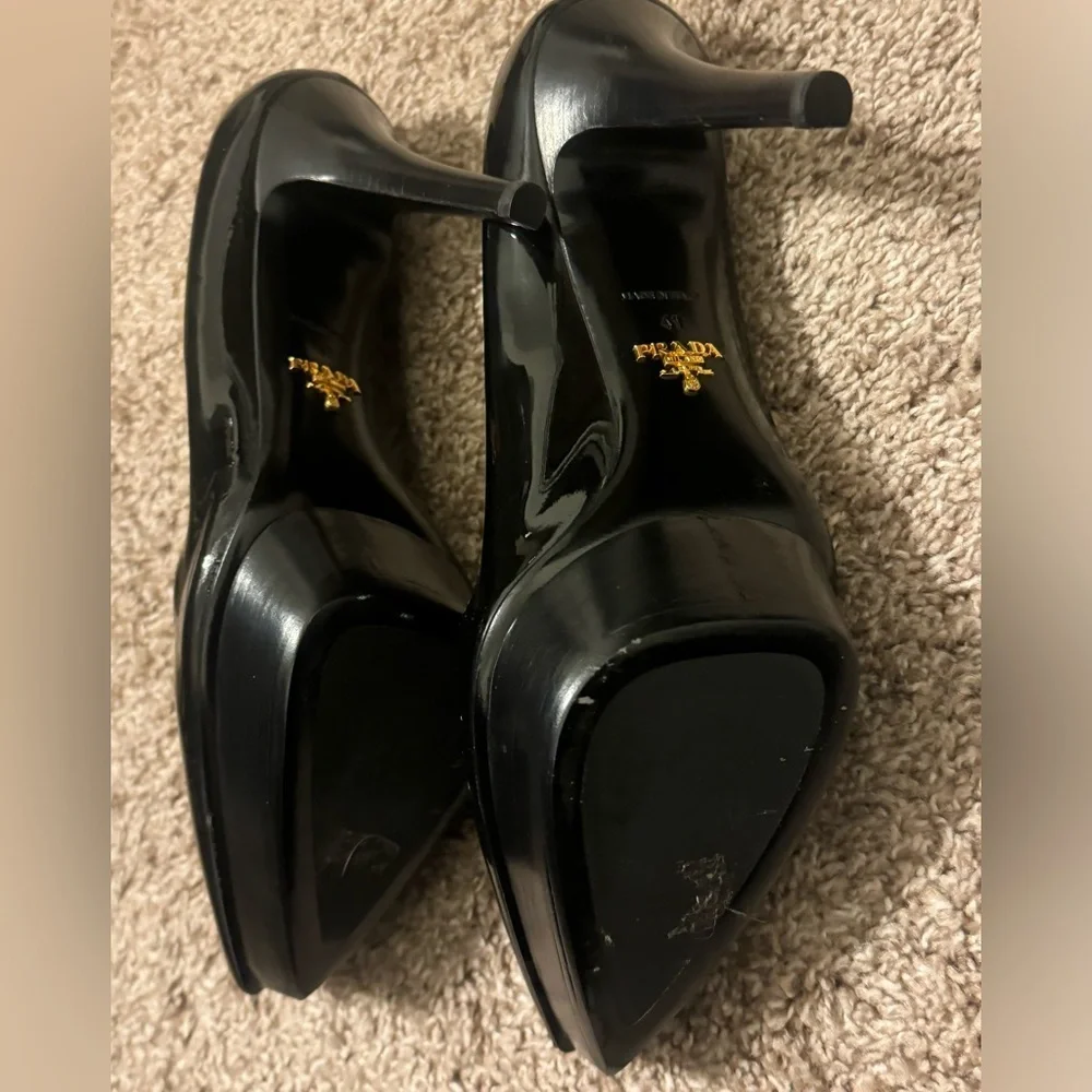 Brand new, without tags. Never worn Prada platform heels.